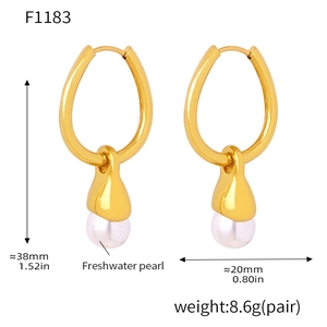 Detail view of 38mm gold hoop earrings with freshwater pearls including dimensions