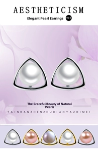 Macro shot of S925 silver geometric triangle earrings with natural freshwater pearls