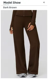Detail of high-waist wide-leg pants and zip-up jacket in deep coffee brown sport set