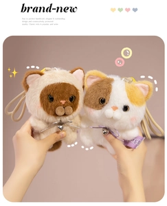 Detailed view of plush cat doll keychains with soft faux fur, ribbons, and small bells