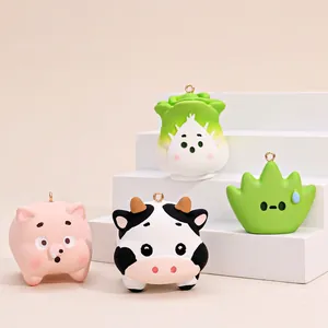 Cute resin cartoon pig and cow keychain set with creative vegetable pendants for bags