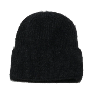Close-up of black faux mink fur beanie with soft thick texture and wide ribbed cuff