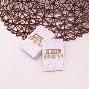 Macro view of Hello Friday gift cards with golden polka dots and thick cardstock