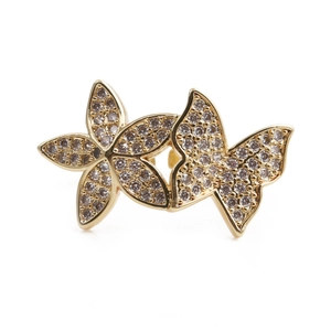 Adjustable golden butterfly ring with sparkling micro-pave crystals on white background