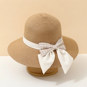 Women's summer straw beach hat with check bow on minimalist gold stand
