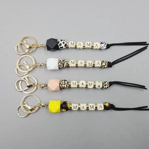 Chic MAMA letter silicone bead keychains in multiple colors with leopard print accents
