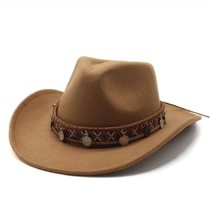 Classic western wool felt cowboy hat in khaki with ethnic braided band and metal coins