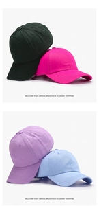 Detail of baseball caps in dark green, magenta, purple, and blue with reinforced stitching