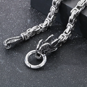 Detail of vintage dragon head clasp on 6mm stainless steel Byzantine chain necklace