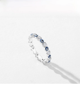 Detail view of S925 silver ring featuring blue enamel evil eye and heart zircon stones