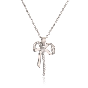 Elegant silver bow pendant necklace with clear zircons and subtle reflection on white back