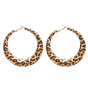 Fashionable leopard print gold hoop earrings featuring bold geometric circular design