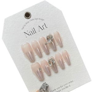 Handmade moonlight white press-on nails with silver chrome and rhinestone accents