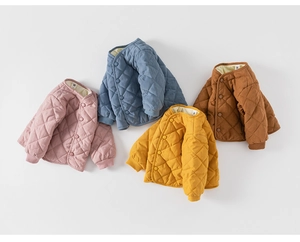 Detailed close-up of quilted cotton toddler jackets in four colors with ribbed cuffs