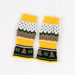 Close-up of thick knitted fingerless gloves with colorful Christmas tree patterns