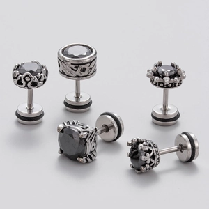 Detailed close-up of multiple men's silver steel studs set with black cubic zirconia