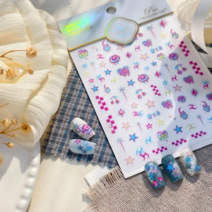 Y2K style nail stickers featuring pink and blue stars, flames, and cherry patterns