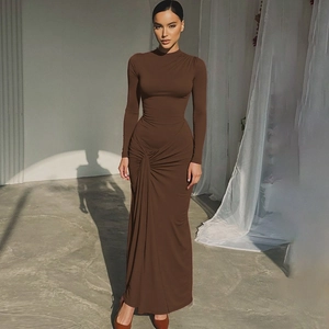 Detail of waist twist pleats on a long sleeve chocolate slim fit maxi dress