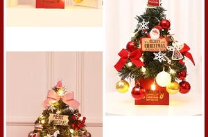 Close-up of a mini desktop Christmas tree with red gold ornaments and warm LED lights