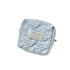 Quilted light blue checkered makeup bag with heart stitching and silver zipper