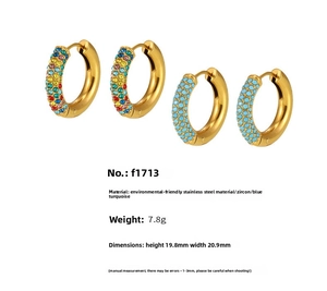 Detail of 20mm gold stainless steel hoop earrings with colorful zircon and turquoise