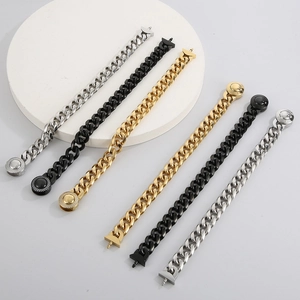 Detail view of gold, silver, and black CNC iced out Cuban link bracelets for men