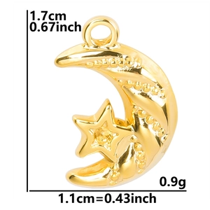Close-up of 18k gold-plated moon and star pendant with precise measurements in inches