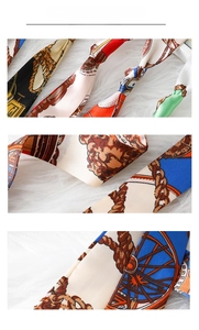 Detailed views of narrow silk-like twilly scarves with vintage horse harness patterns