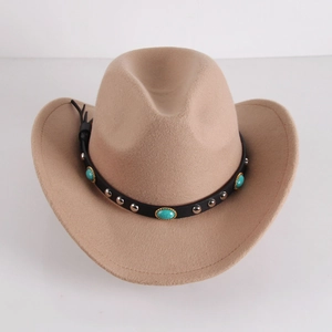 Detail of western cowboy hat band with silver rivets and turquoise stones