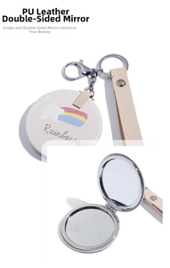 Detail of compact PU leather double-sided mirror with rainbow print and hanging strap