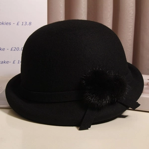 Classic black wool felt cloche hat with ribbon and heart-shaped pom pom decoration