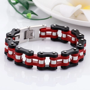 Detail of red and silver motorcycle chain bracelet in stainless steel with secure clasp