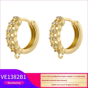 Macro detail of gold plated brass hoop earrings with cubic zirconia and DIY hook