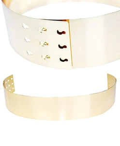 Close-up of golden metallic mirror belt showing adjustable buckle and polished finish