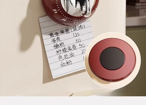 Mechanical kitchen timer in red finish with strong magnetic back for fridge attachment