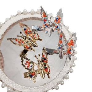 Elegant gold and silver moving butterfly hair clips with colorful beads on lace base