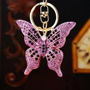 Creative purple rhinestone butterfly keychain with gold plating and sparkling crystals