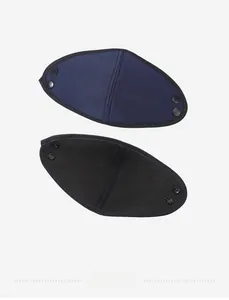 Detail of winter trapper hat face mask attachment with secure metal snap buttons