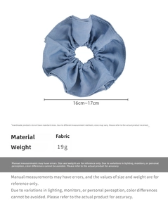 Detailed view of 16-17cm blue fabric scrunchie with size and weight specifications