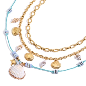 Bohemian multilayer stainless steel necklace with seashell and starfish pendants on white