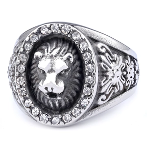 Detail of vintage lion head ring with embossed mane and sparkling rhinestone inlay