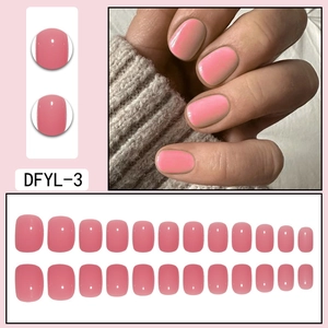 Short round pink press-on nails with shiny gel texture and 24 pieces display