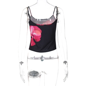 Detail of pink orchid print on a black slim-fit cropped camisole with thin straps