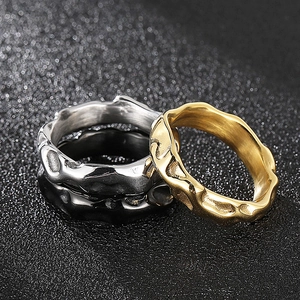 Irregular textured titanium steel rings in gold and silver colors with wave design