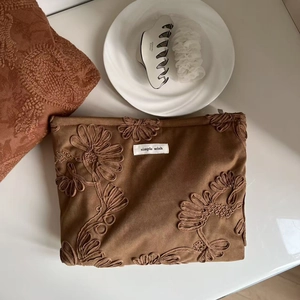 Retro camel suede cosmetic bag with floral embroidery and simple wish label