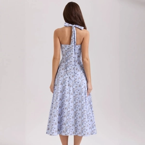 Sexy backless light blue floral halter dress with a ribbon bow and slim fit design