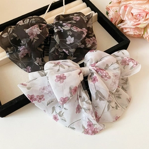 Eleganti mollette per capelli con fiocco in chiffon floreale in nero e bianco