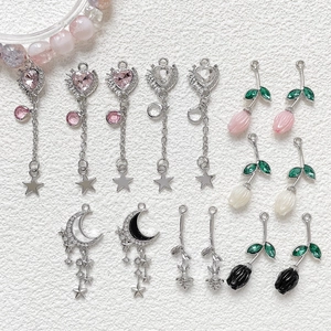Assorted DIY heart tulip and moon alloy pendants for handcrafted necklaces and jewelry