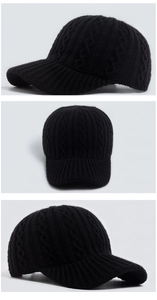 Three-way view of a black cable knit baseball cap showing texture and structure