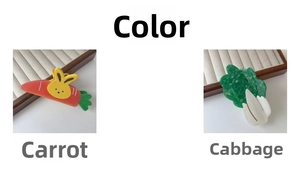 Detailed macro view of creative carrot and cabbage shaped acetate hair claw clips